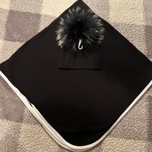 Receiving blanket with matching Pom Pom hat for newborn baby.